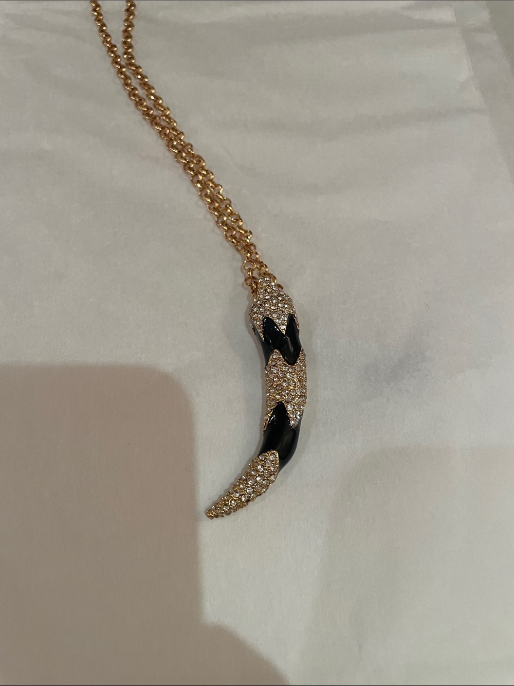 CC Skye Gold-Tone Horn Pendant Necklace with Black Enamel & Crystal